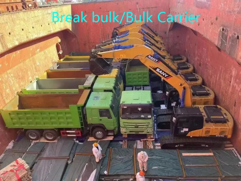 Break-bulk carrier hold loaded with trucks and excavators for Cuba shipment